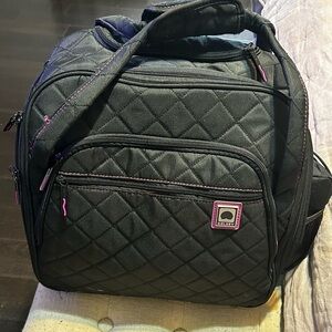 Delsey Paris carry on roller bag. In great condition